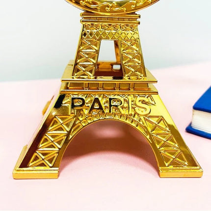 Elevate your decor with this Charming Eiffel Tower Tabletop Alarm Clock Enhance your fancy home decorations with this decorative silver timepiece