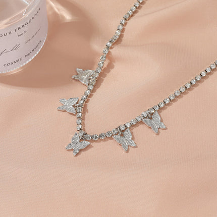 Silver Metal Butterfly Anklet Stylish Summer Fashion Jewelry for Women. Perfect for Beach Wear and Casual or Party occasions. Hook Closure for easy wearing.