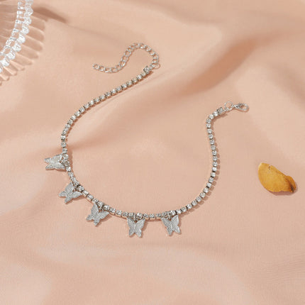 Silver Metal Butterfly Anklet Stylish Summer Fashion Jewelry for Women. Perfect for Beach Wear and Casual or Party occasions. Hook Closure for easy wearing.