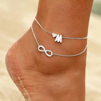 Stylish Silver M Alphabet Infinity Shaped Metal Anklets with Hook Closure Perfect Beach Wear Fashion for Women!