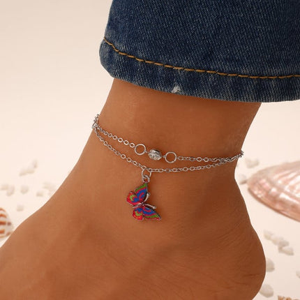 Shimmering Crystal Butterfly Anklet The Ultimate Summer Fashion Statement for Women! Metallic silver plated multi-colored crystals and a secure hook closure! Perfect for beach parties casual wear or adding a touch of glamour to any outfit!