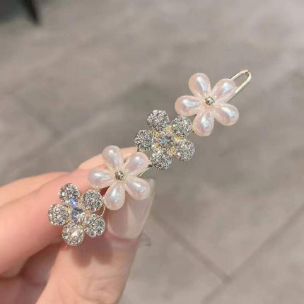 Japanese and Korean elegant imitation cat-eye flower Frog buckle side clip hairpin - White Gold