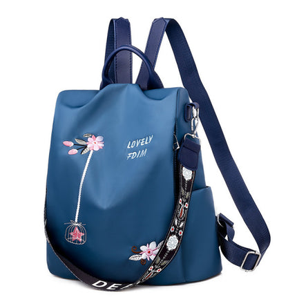 Floral Embroidery Double Handle Backpack Waterproof Multifunctional Travel Bag for Women. Wide Capacity Oxford Exterior Polyester Interior Canvas Straps Zipper Closure. Perfect for Outdoor Occasions. Blue Shade.